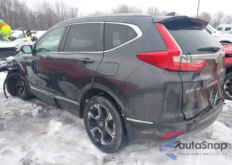 2019 Honda Cr-V Touring z USA, uszkodzony, nr VIN 7FARW1H90KE013970
